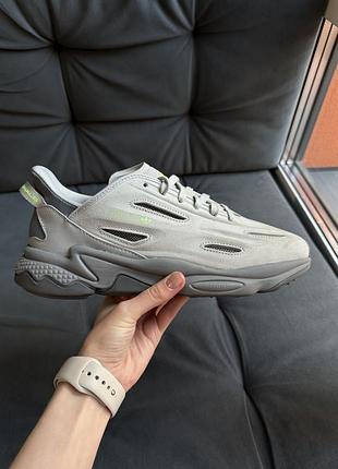 Adidas ozweego celex стильні кросівки в сірому кольорі.