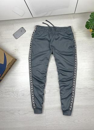 Оригінальні спортивні штани nike sportswear tapered pants