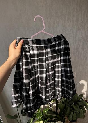 Тенісна міні-спідниця у клітинку