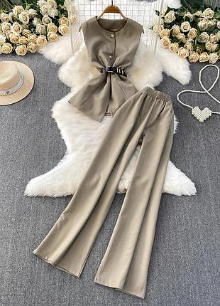 Костюм з ременем