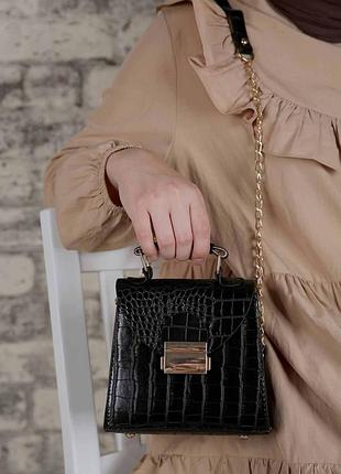 Маленька сумочка через плече