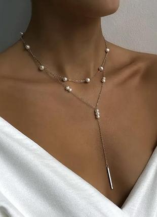 Срібний ланцюжок оздоблений перлинами