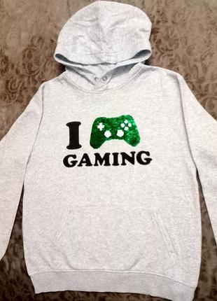 Кофточка детская на 12-14 лет 
украшена пайетками которые при переворачивании меняют цвет