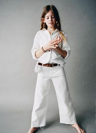 Крутые джинсы палаццо с необработанным низом zara