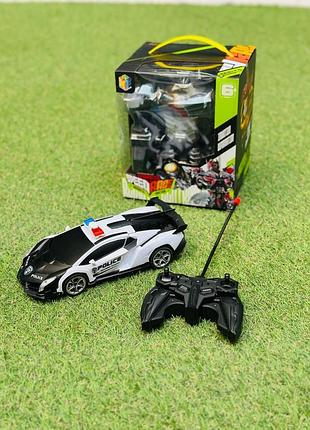 Робот трансформер поліцейська машина з мигалкою на пульті управління для хлопчика 5+ років машинка на радіокеруванні