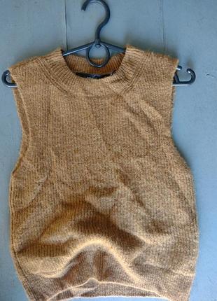 Желет трикотажний ,відомий бренд ,
розмір вказаний xs.