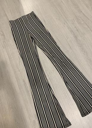 Жіночі смугасті брюки кльош чорні класичні штани