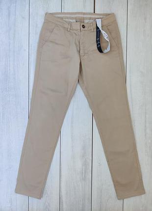 Якісні чоловічі базові брюки штани бежевого кольору пояс 42 см  33 р