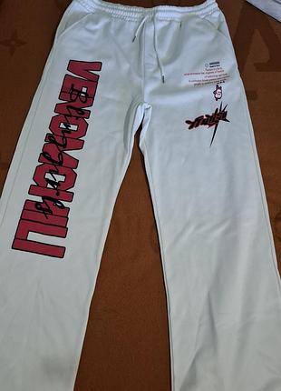 Жіночі широкі спортивні штани теплі з принтом