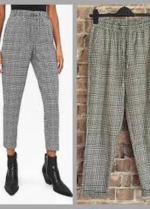 Брюки в крупную клетку черно-белую bershka xs