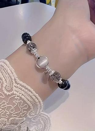 Браслет из звеньев со вставками опала и лунных камней