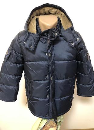 Чудова  тепла  курточка в темно синьому кольорі. ріст140.