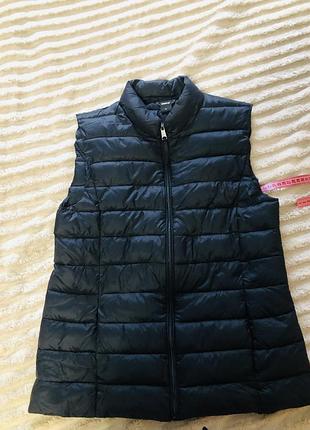 Жіноча жилетка