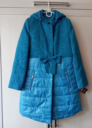 Теплое пальто на девочку 9-10 лет, рост 134см. состояние новое. можно носить осень - теплая зима.