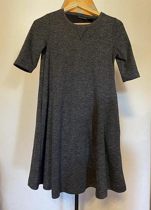 Тепленька сукня з карманами