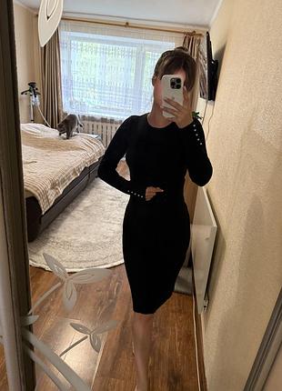 Трикотажна сукня в рубчик