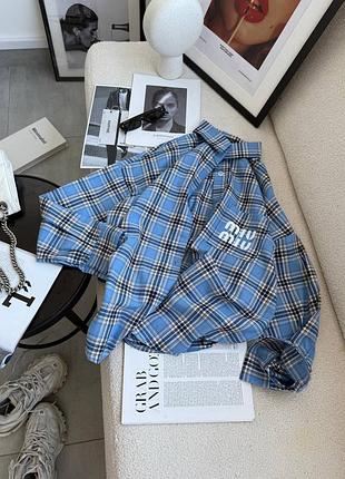 Синяя рубашка в клетку, желтая рубашка в клетку