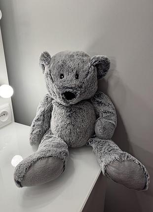 Сіра мʼяка іграшка ведмедик