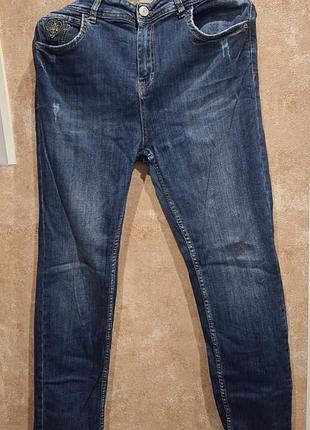 Женские джинсы 33р.