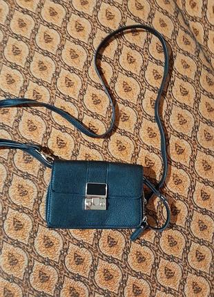 Маленькая фирменная сумка на длинном ремешке next