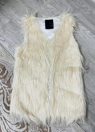 Хутряна жилетка