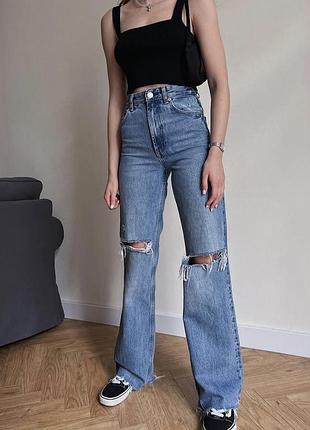 Джинсы широкие с разрезами