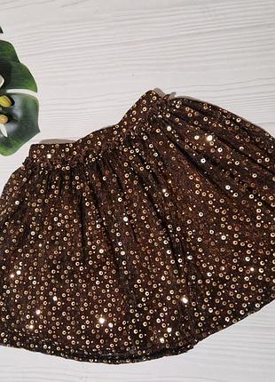 Коричнева ошатна спідниця з паєтками на 6 років