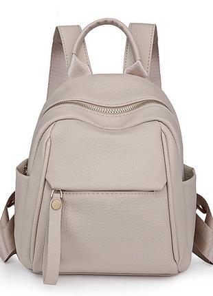 Світло-бежевий маленький жіночий рюкзак, однотонний рюкзачок зі штучної шкіри світло бежевого кольору