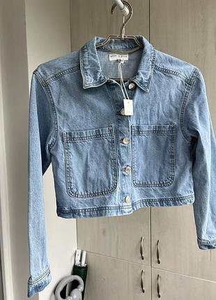 Джинсова куртка для дівчинки