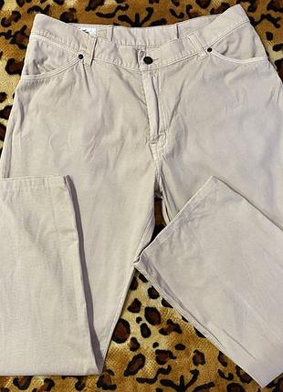 Джинси lacoste