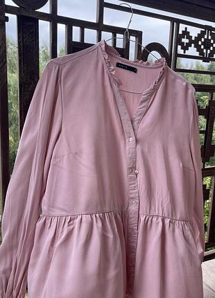 Рожева блуза з баскою