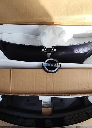 Nissan ariya пластик переднего бампера, значек