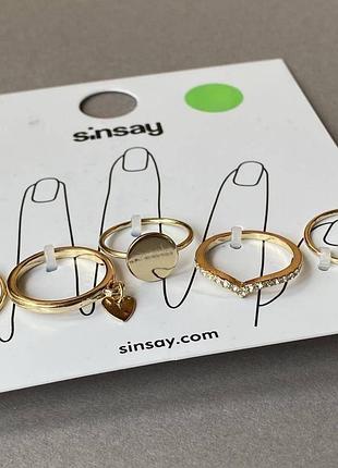 Золотисті кільця sinsay, набір різних дизайнів