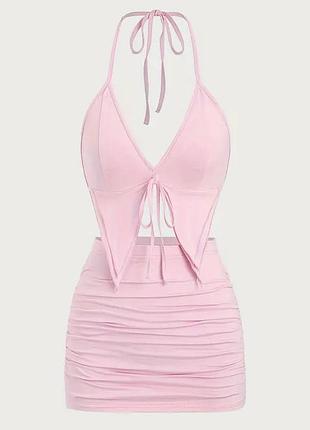 Рожевий комплект з топу та спідниці