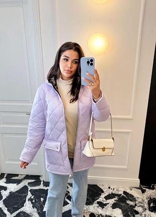 Гарна тепла куртка зі стьобаної плащівки лаке з карманами на застібках