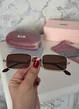 Солнцезащитные очки miu miu