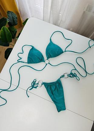 Бірюзовий ( колір морської хвилі) з блиском купальник bershka s розміру