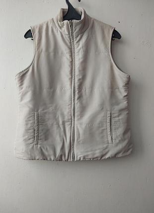 Жіноча жилетка