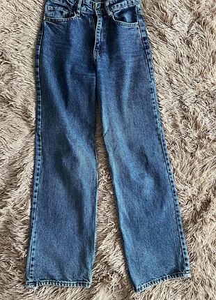 Сині цупкі джинси висока посадка
