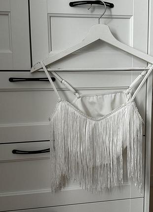 Ефектний білий топ з бахромою