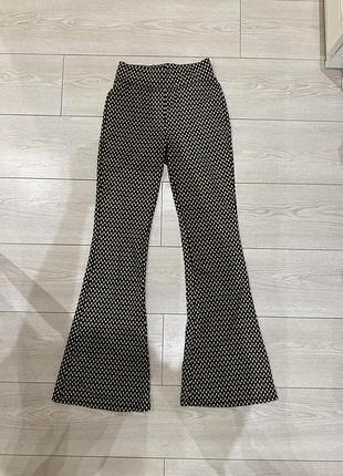 Штани з візерунком коричневі