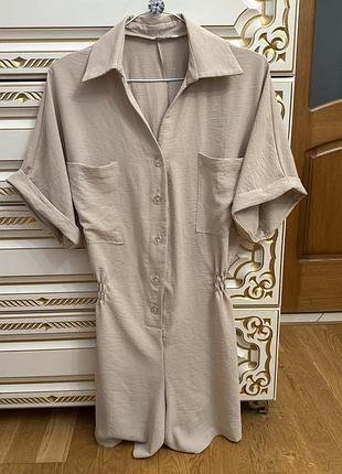 Тілесний комбінезон з шортами і кишенями