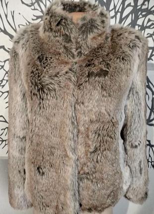 Женская шуба в состоянии новой