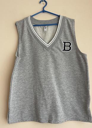 Жилетка в спортивному стилі