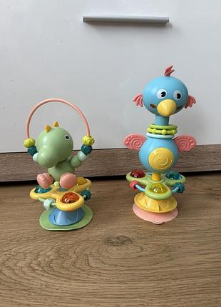 Іграшки для  малюка на присосках