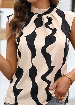 Жіноча нарядна бежева блуза з геометричним принтом