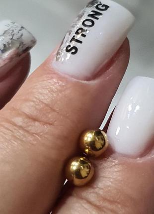 Елегантні сережки-гвоздики з нержавіючої сталі золотого кольору