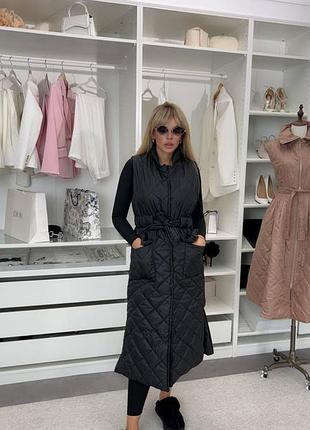 Жіночий подовжений стьобаний жилет