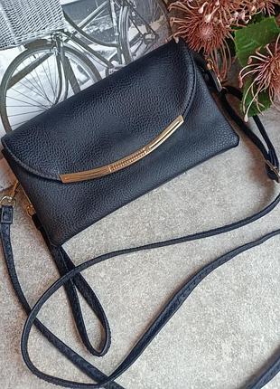 Маленькая сумочка с длинной и короткой ручкой черного цвета материал искусственная кожа