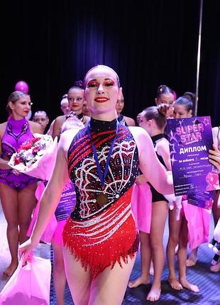 Костюм для пілону, фламенко 
дуже гарний костюм, весь у стразами, шили за 8 продаю за 5